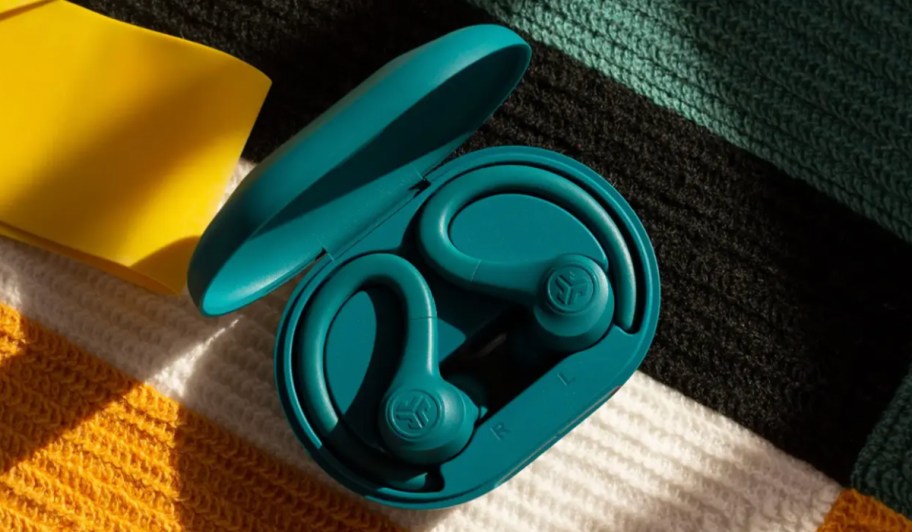 earhook earbuds in teal charging case