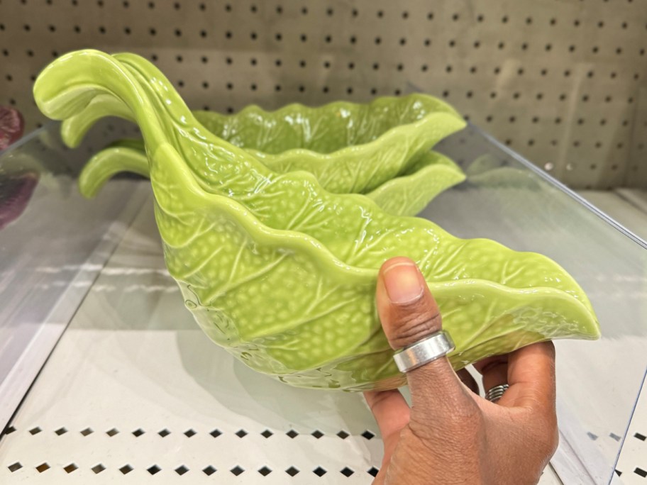 hand holding cabbage gravy boat