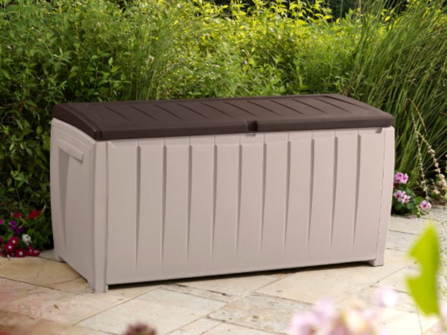 keter 90 gallon deck box outside on patio