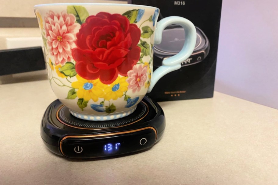 florla print mug on top of a lerat coffee mug warmer