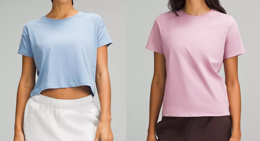 women in blue and pink t-shirts