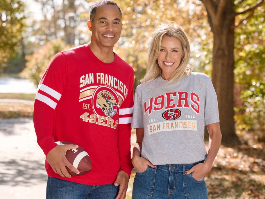 man and woman in nfl shirts