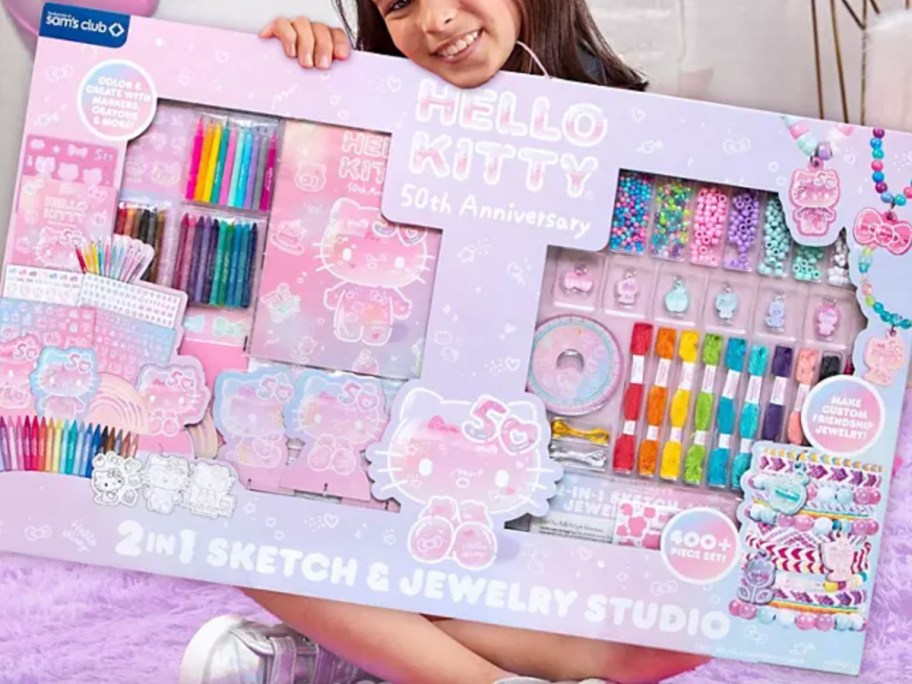 girl holding hello kitty activity case 