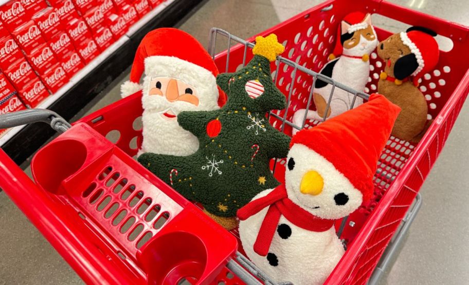 shaped target holiday throw pillows in a red shopping cart