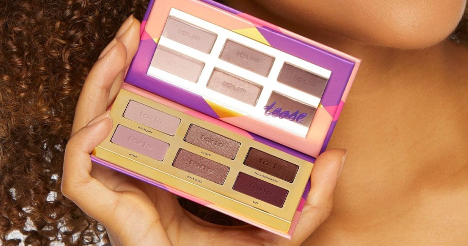 hand holding tartellete amazonian palette 