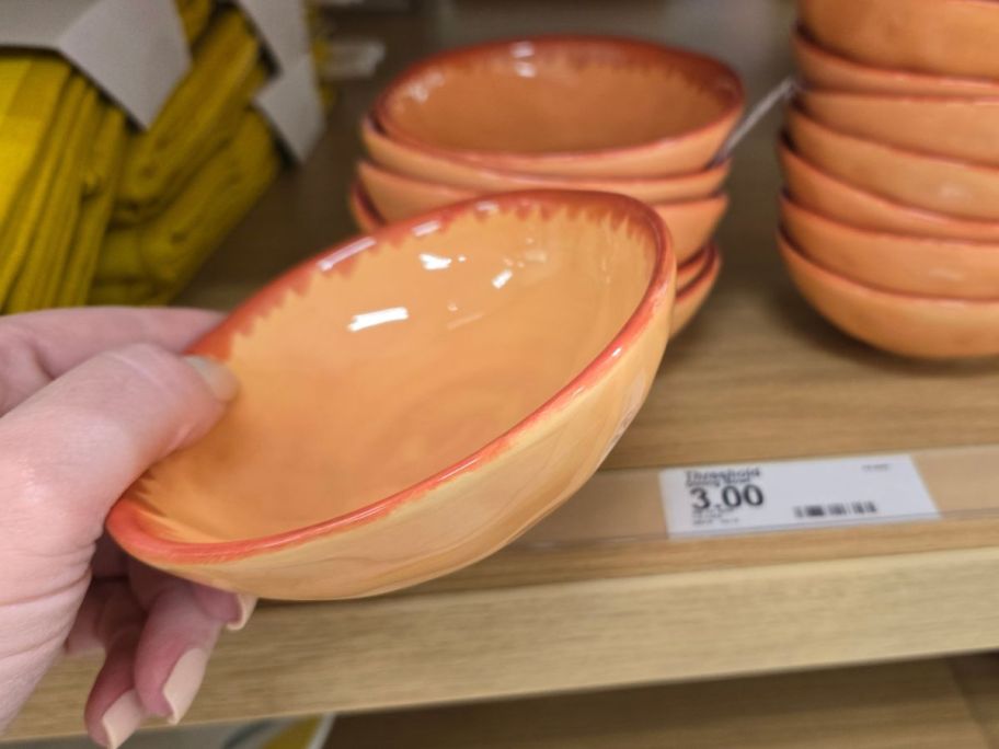 peach colored Threshold Stoneware Mini Bowl in hand in store