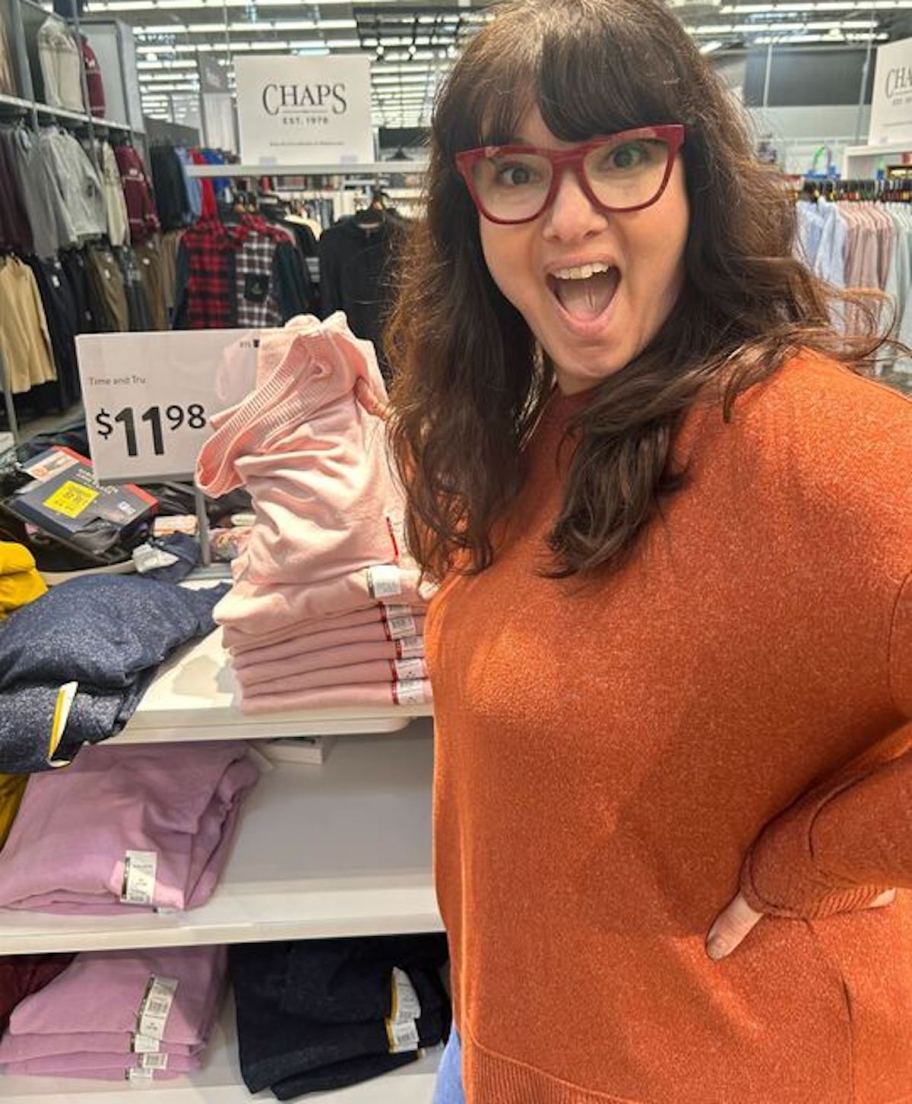 woman wearing burnt orange sweater in walmart