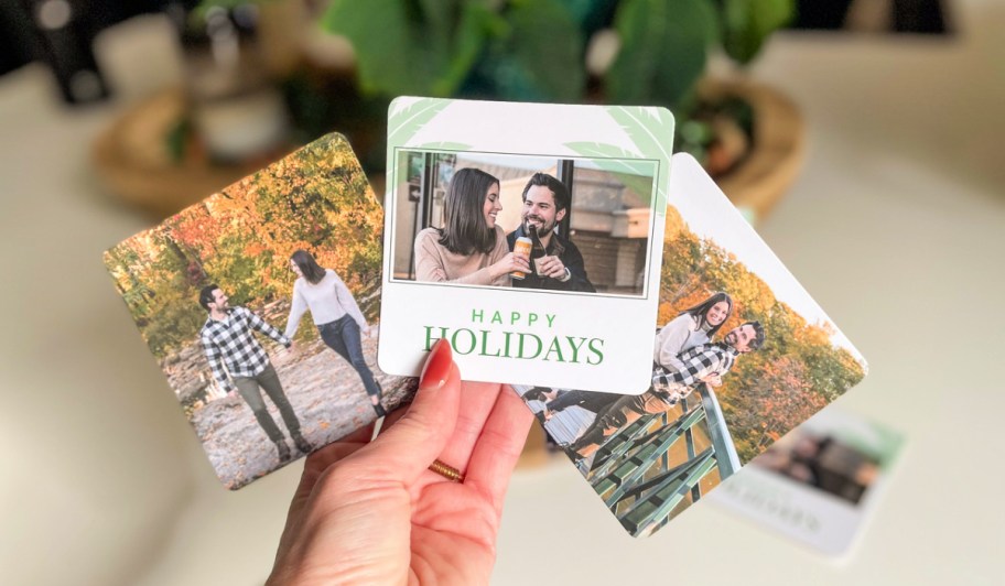 walgreens photo coasters in a woman's hand