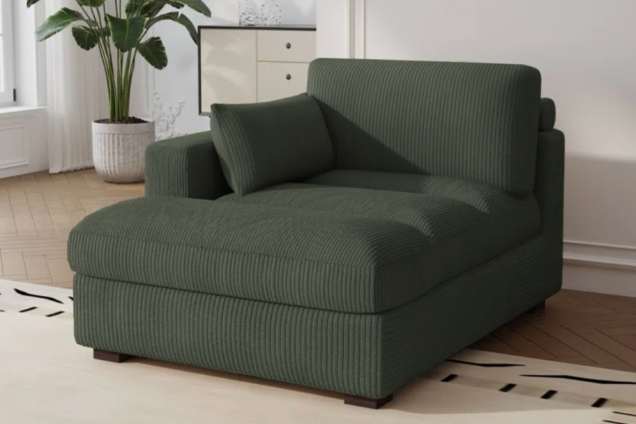 green upholstered chaise chair