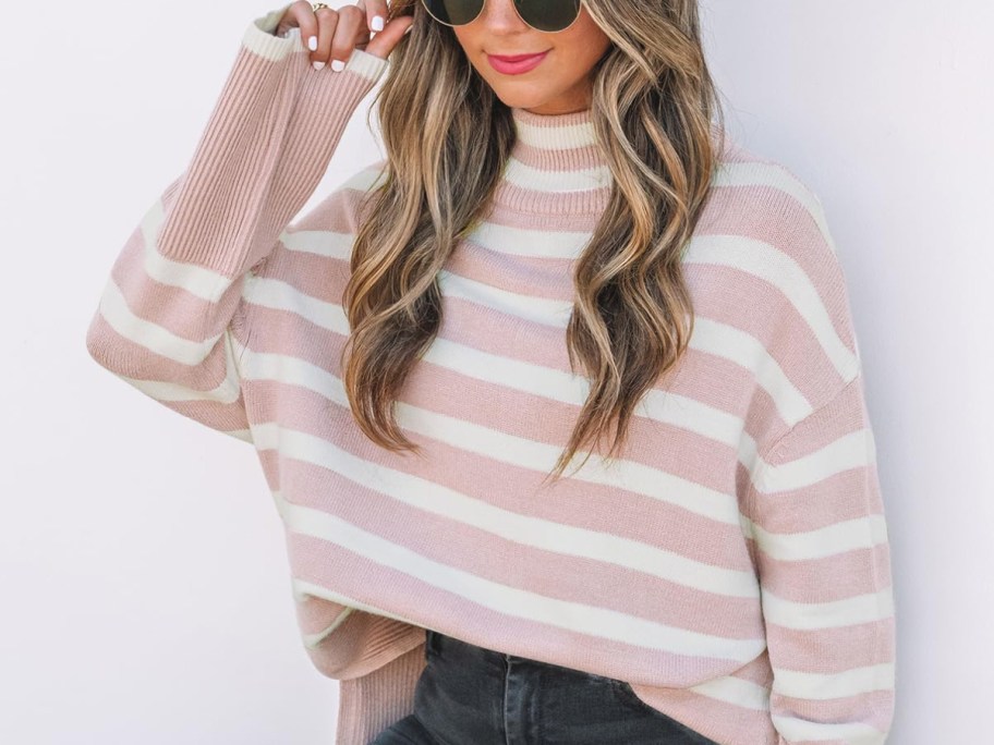 woman-wearing-long-sleeve-stripped-shirt.