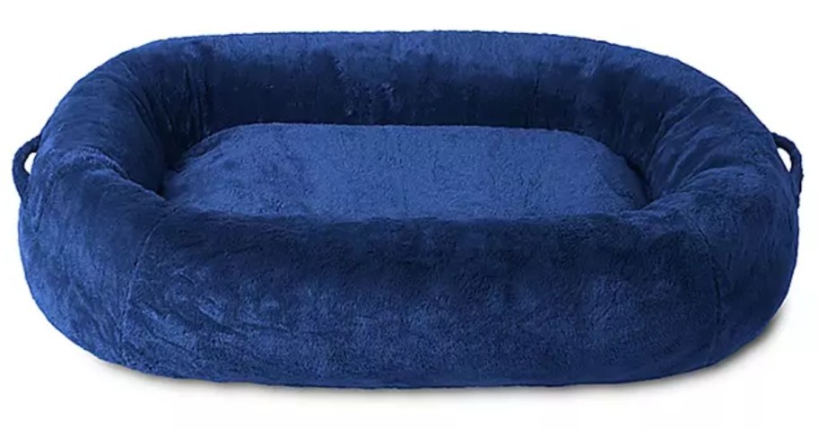 a large blue human sized dog bed