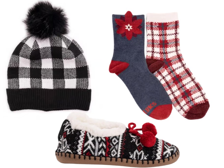 a women's black and white plaid beanie with pom pom, a fair aisle print women's slipper, and 2 holiday socks, one blue with red poinsettia and one red and white plaid