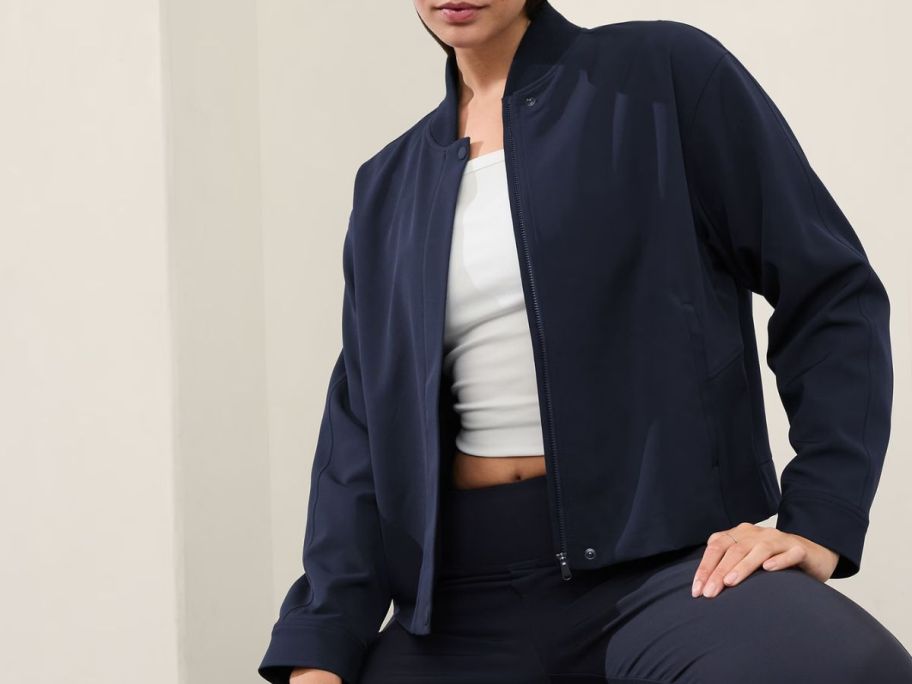 Woman wearing a Athleta Endless Bomber Jacket