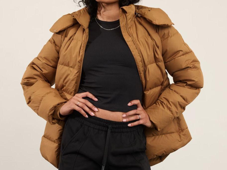 Woman wearing an Athleta Puffer Jacket