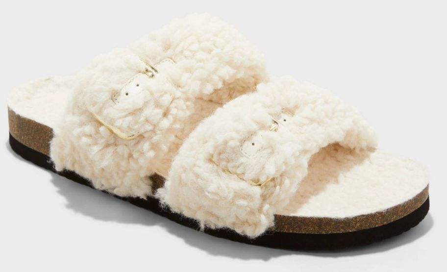 cream colored womans slipper stock image