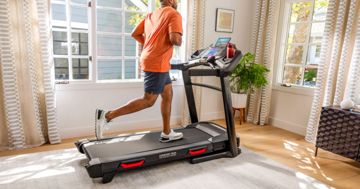 man running on Bowflex BXT8J Treadmill