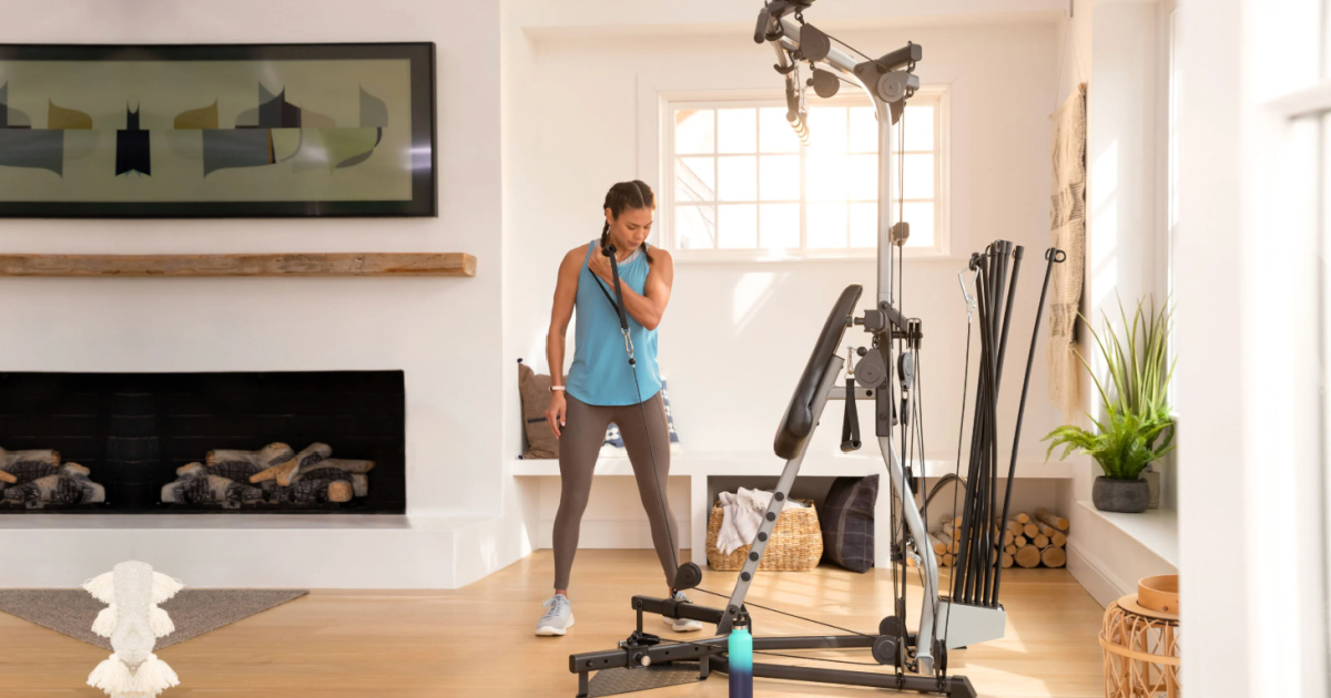 girl working out with Bowflex Xtreme 2 SE Home Gym