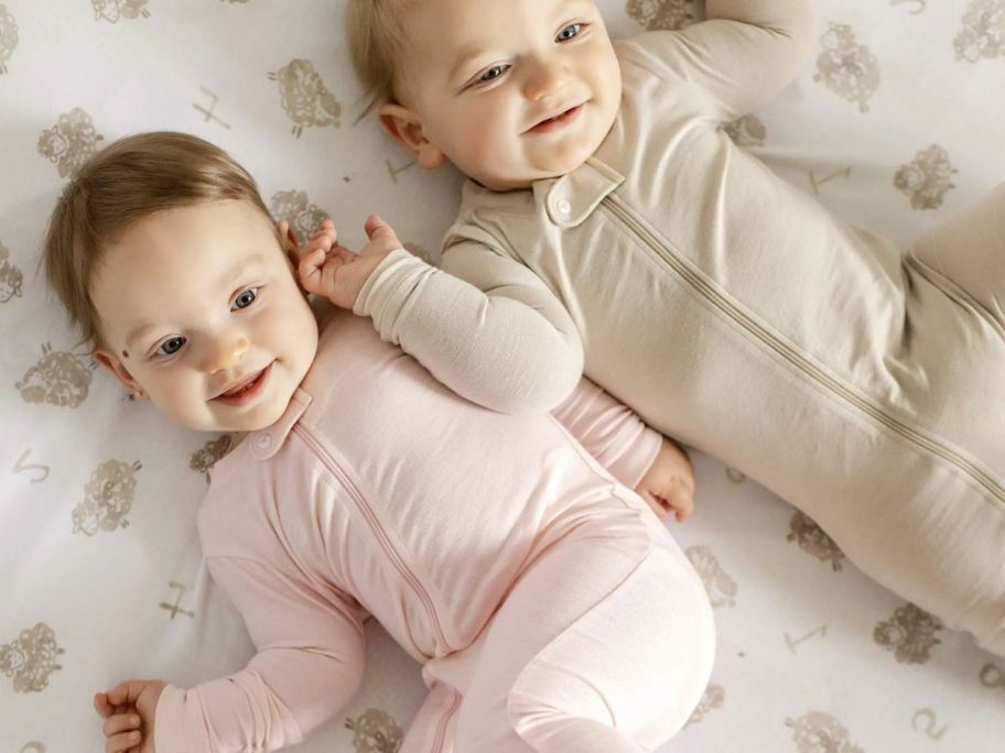 Baby girl and boy wearing Burt's Bees Honeysoft pajamas