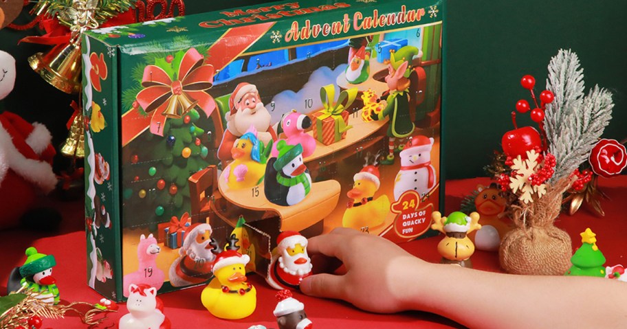 hand opening square on christmas ducks advent calendar