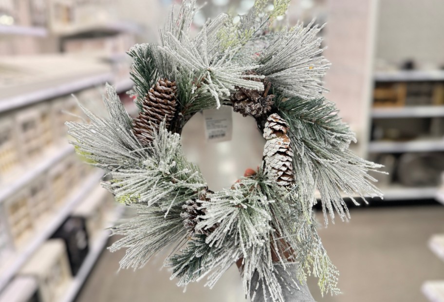 Christmas flocked wreath with pinecone