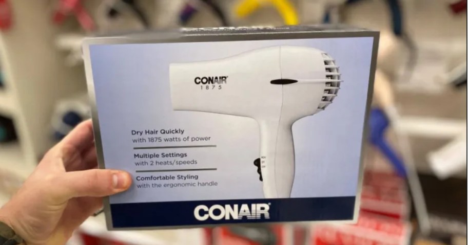 hand holding hair dryer