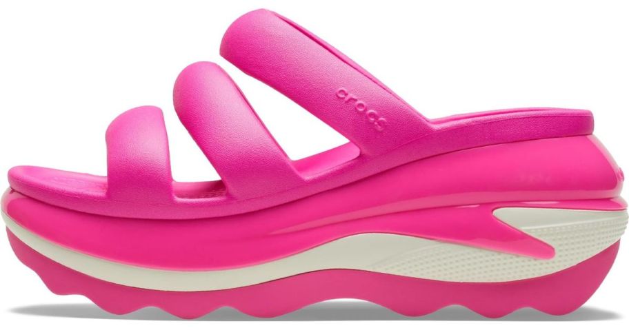 A pink Crocs Mega Crush Triple Strap Sandal 