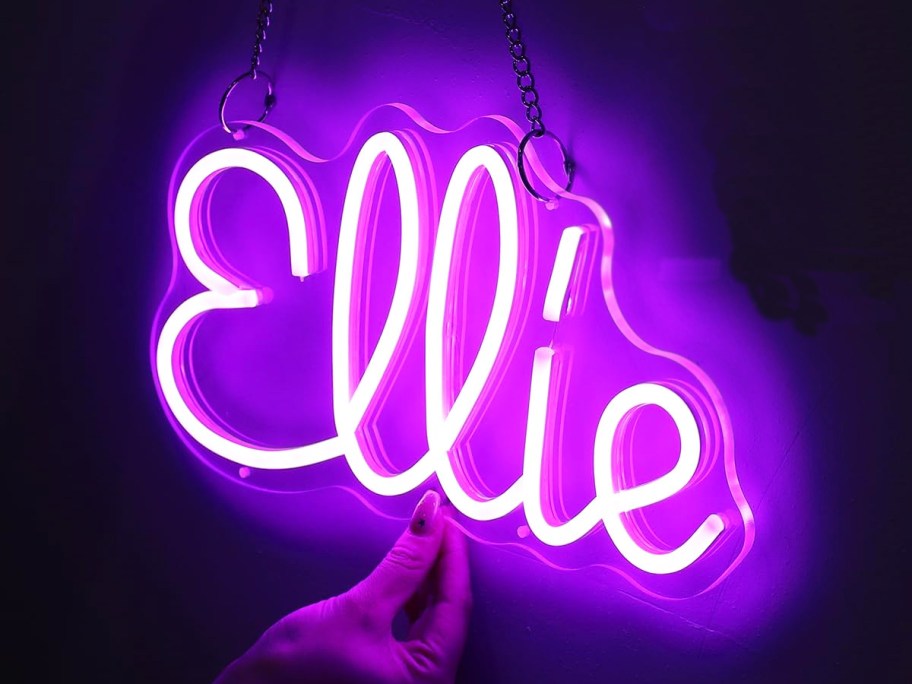 purple led sign that says "ellie"