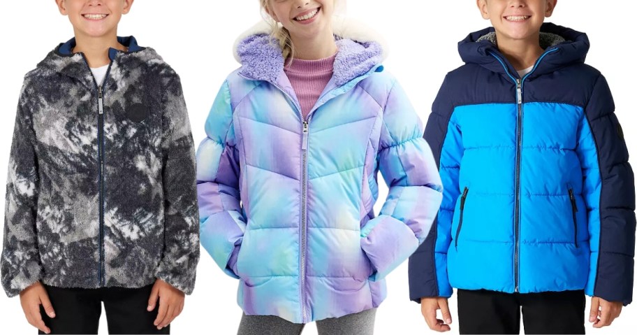 3 kids wearing different styles and colors of winter coats