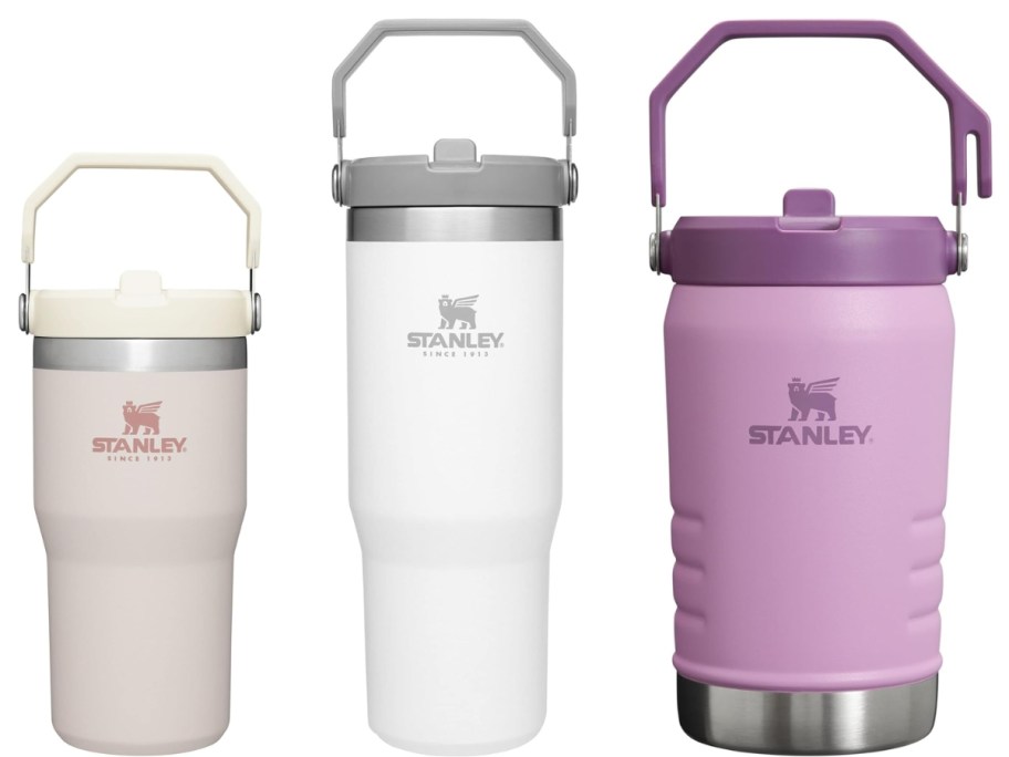 3 Stanley Ice Flow Tumblers, a smaller 20oz in light pink Rose Quartz, a medium size 30oz in Polar white, and a large 40 oz jug style in Lilac purple