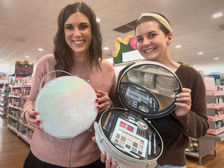 Two women holding Joybrite beauty boxes at Ulta