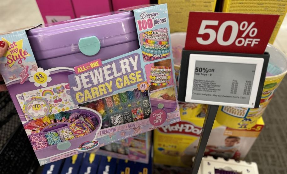 a jewelry making kit with case on a store display