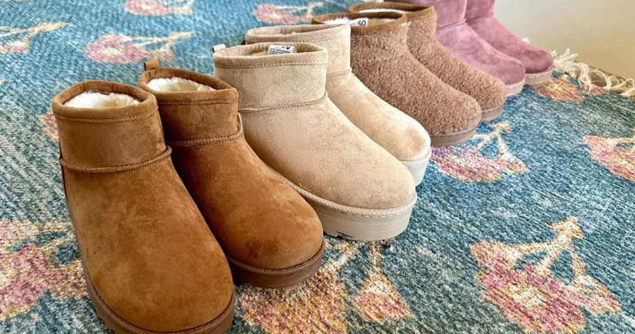 4 pairs of Kohl's Sonoma Lipita Boots Lined up on a carpet