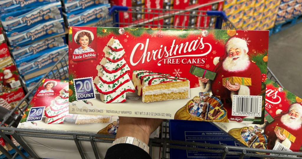 large box of Little Debbie Christmas Tree Cakes in sams club cart