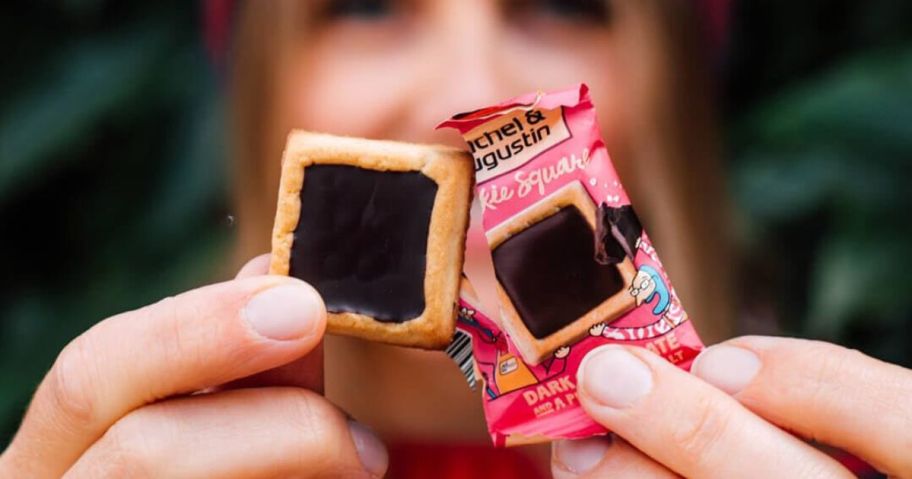 person holding up cookie