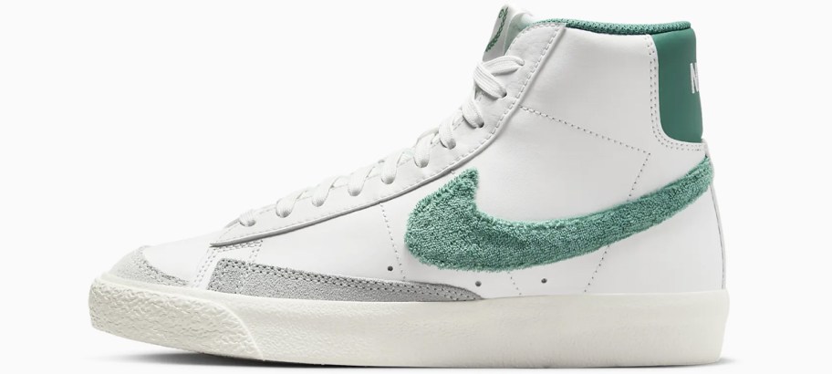 white high top sneaker with green accents