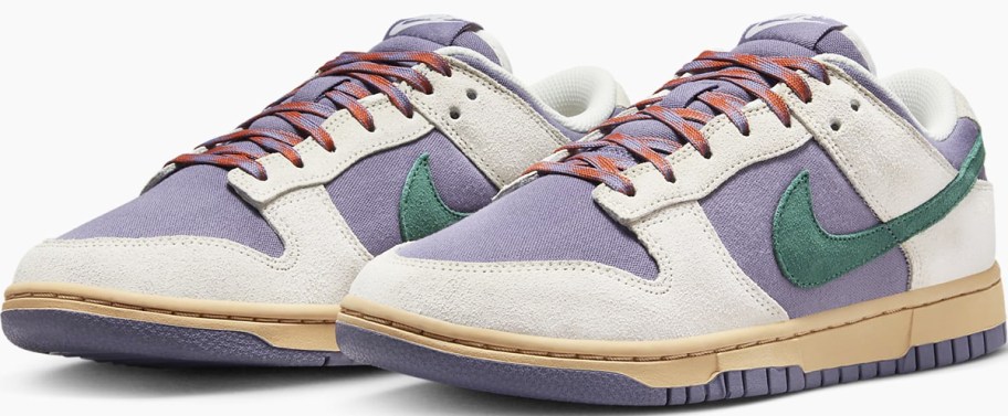 women's Nike dunk low shoes in white with purple, green, and pink accents