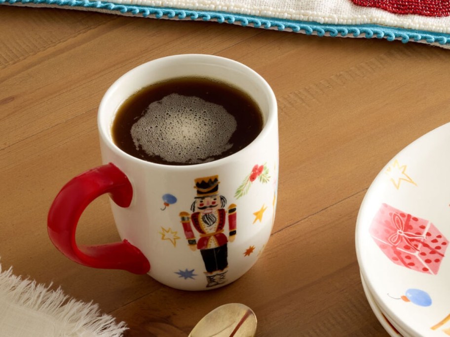 World Market Nutcracker Ceramic Mug on table