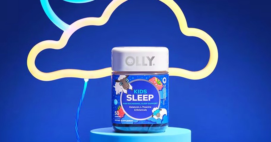 bottle of OLLY Kids Sleep Gummies in front of cloud shaped LED light