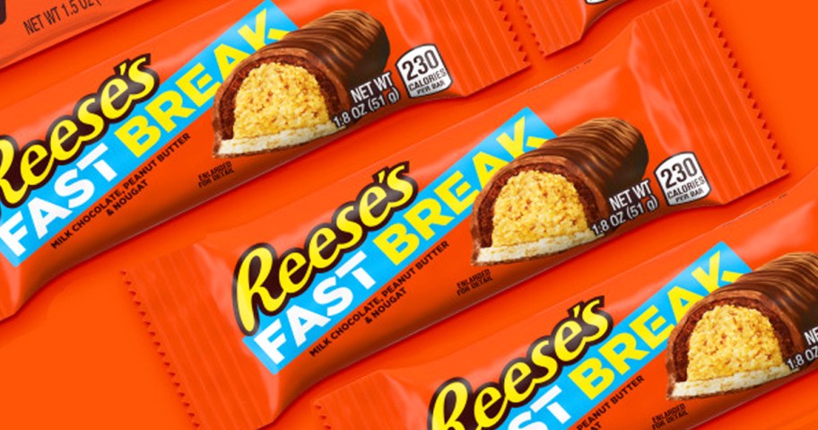 Reese's Fast Break Candy Bars on orange background