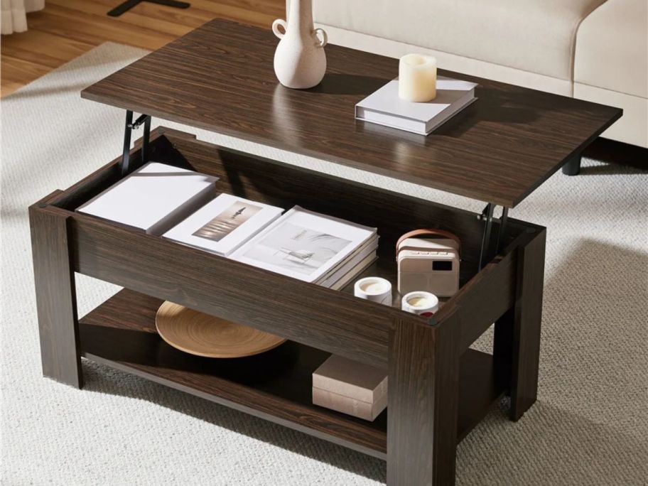A brown lift top coffee table 