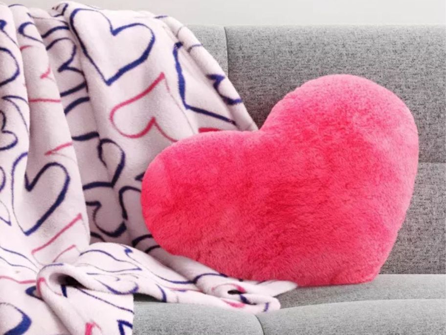 Room Essentials Plush Shaped Heart Throw Pillow - Pink on couch