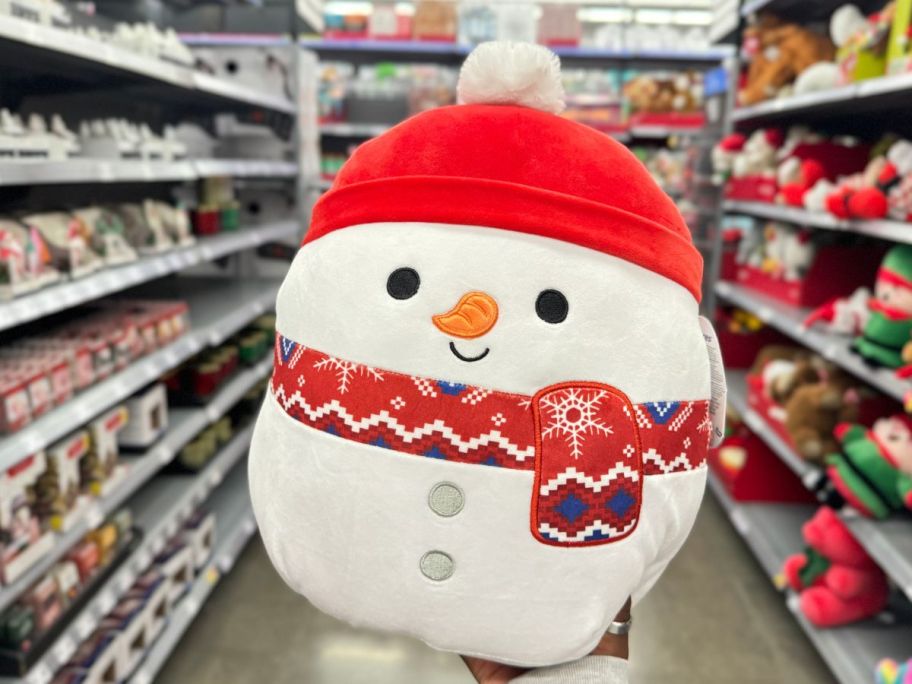 Squishmallows 12" Manny the Snowman in hand in store