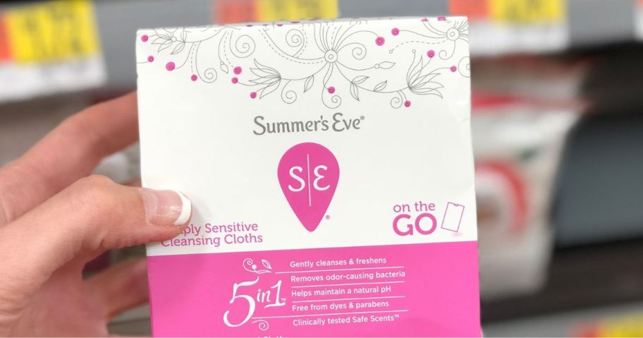 Hand holding a box of Summer's Eve Cleansing Cloths