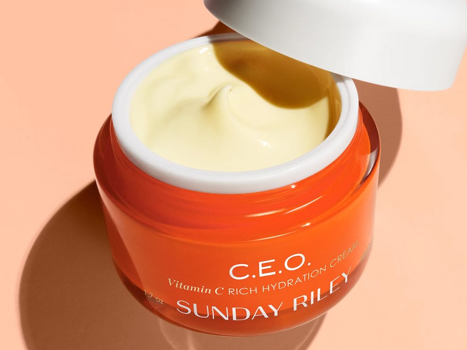 opened orange jar of Sunday Riley C.E.O. Vitamin C Rich Hydration Cream