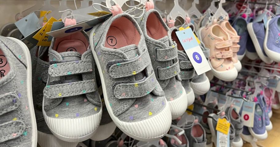 Cat & Jack Kids sneakers hanging on racks at Target