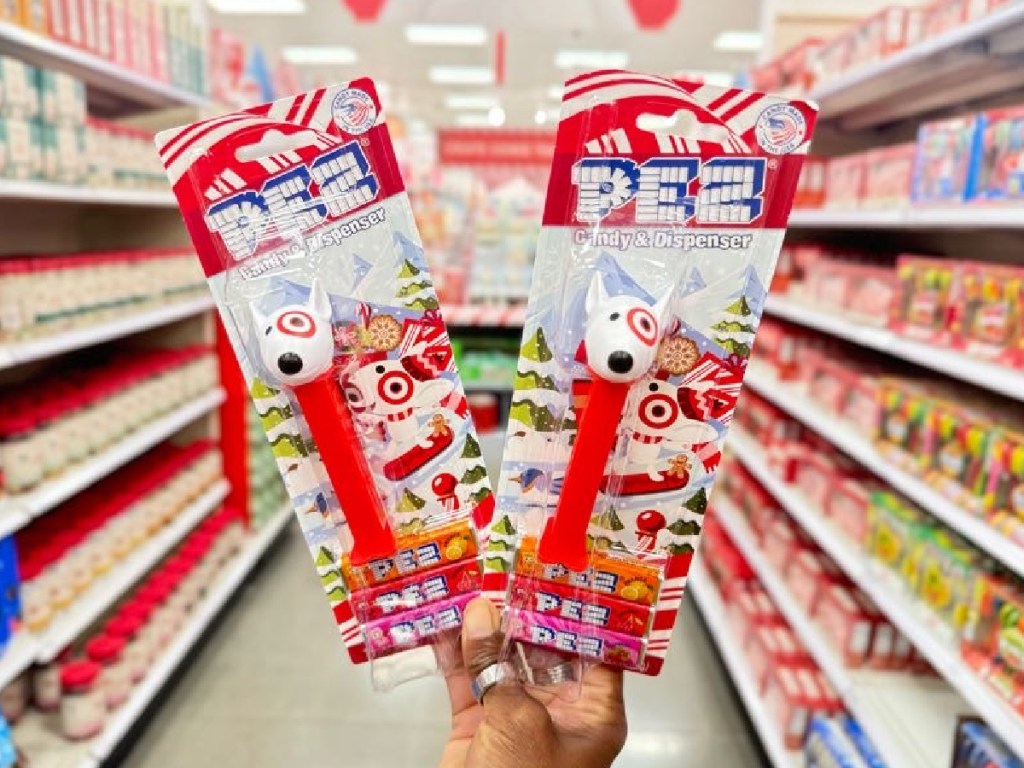 woman holding up Target Pez Candy Dispenser