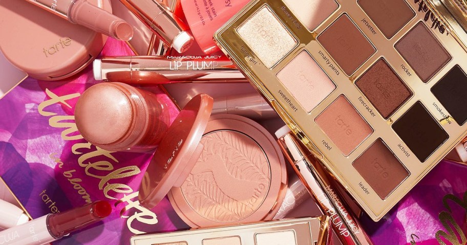 various tarte cosmetics items in a pile