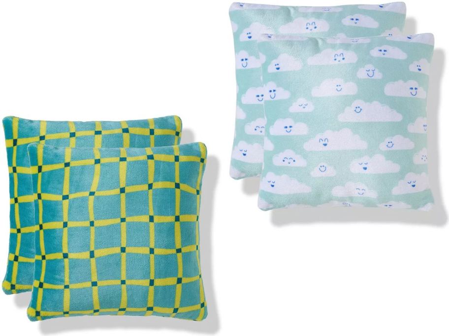 Stock images of two The Big One Kids Printed Plush 2-Pack Pillow Sets