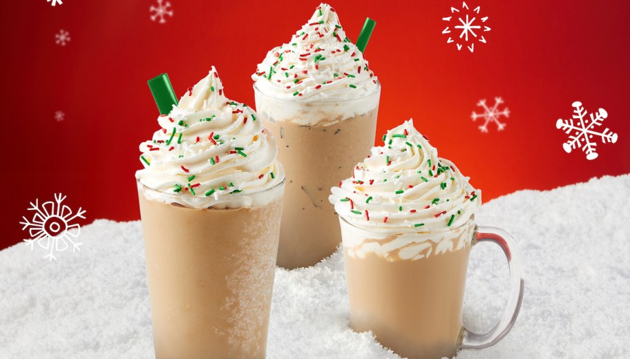 festive iced drinks on fake snow and red background