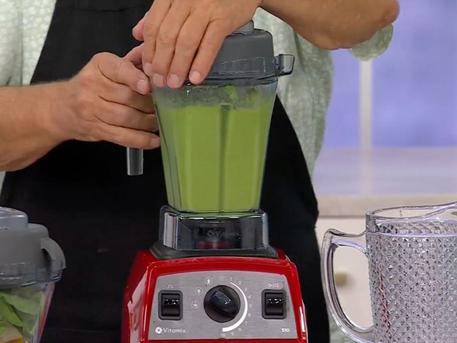 Man using a Vitamix Propel Blender to make a smoothie